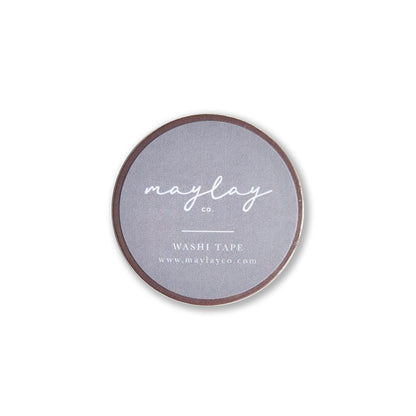 The image showcases a circular gray label for the brand Maylay Co. at its center. The text emphasizes the company's name, "I Am Grateful Washi Tape - Mauve," and includes their website: www.maylayco.com. This label is appealing to decorative washi tape enthusiasts, making it perfect for scrapbooking supplies on a pristine white background.