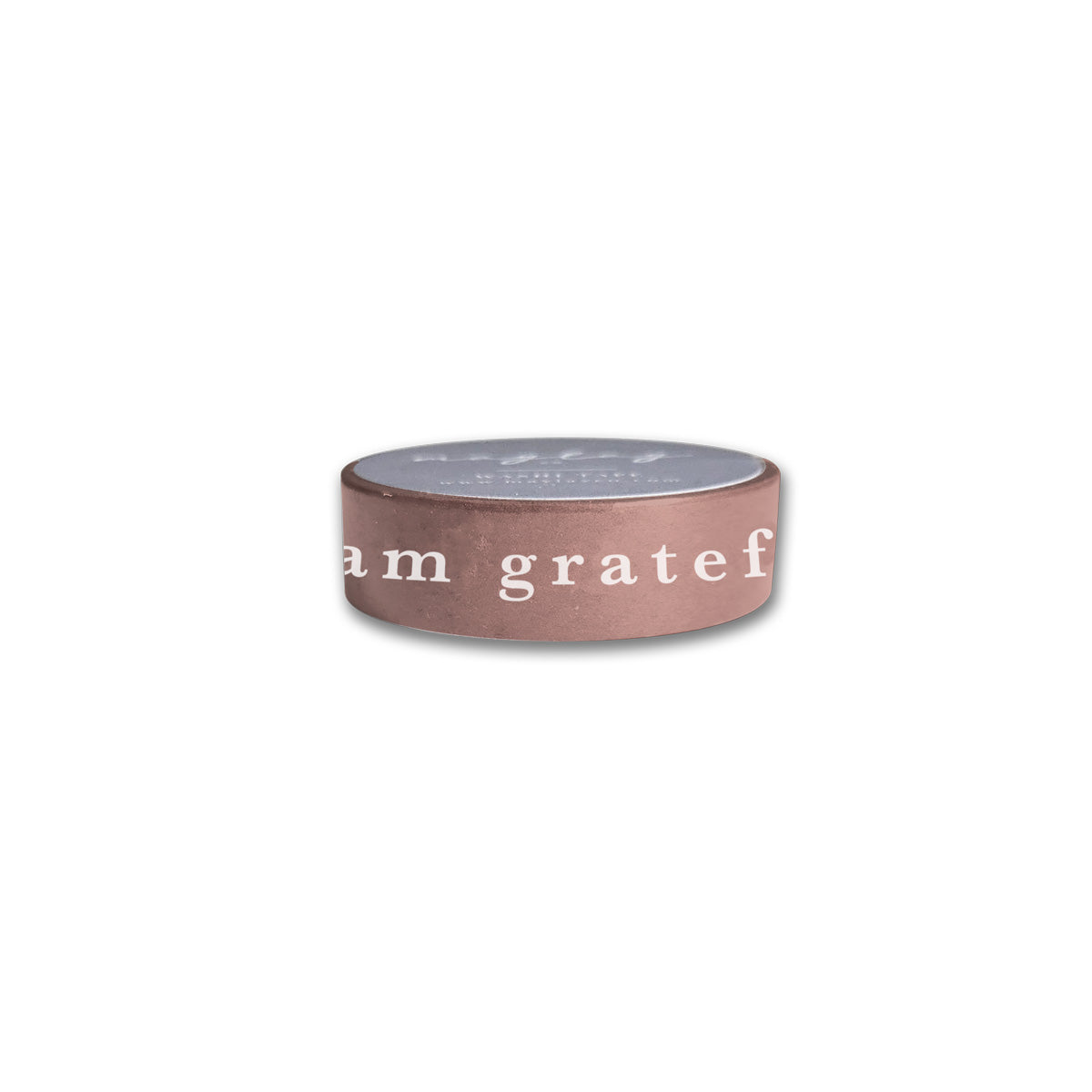 The "I Am Grateful Washi Tape - Mauve" by Maylay Co. is housed in a small, round container featuring a light brown side with the text "I am grateful." Its gray top showcases subtle text and exudes a minimalistic charm, making it perfect for organizing your decorative washi tapes or other scrapbooking supplies. The image is set against a white background for clarity.